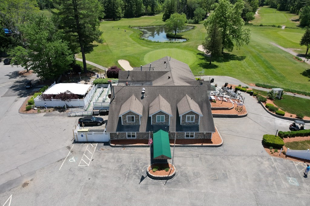 53 Baldwin Road, Unit 403 Billerica, MA 01821 - Photo 38 of 40 an aerial view of a house with outdoor space