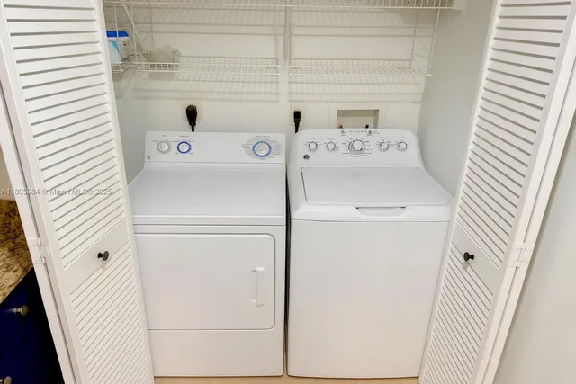 a utility room with dryer and washer