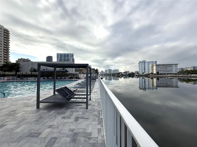 a view of swimming pool from a balcony