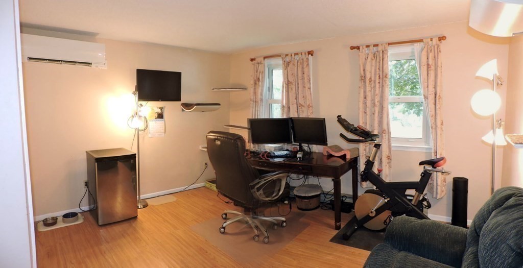 2 Hall Road Webster, MA 01570 - Photo 16 of 42 a view of a workspace with furniture and a window