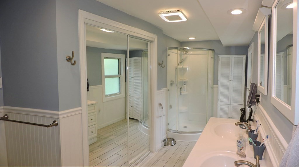 2 Hall Road Webster, MA 01570 - Photo 27 of 42 a bathroom with a tub shower and sink
