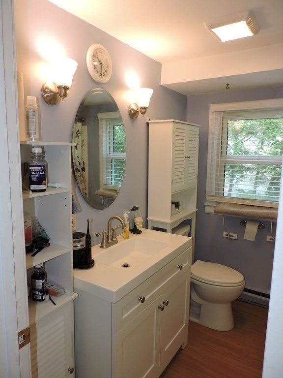 2 Hall Road Webster, MA 01570 - Photo 31 of 42 a bathroom with a toilet sink and mirror