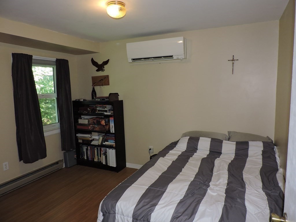 2 Hall Road Webster, MA 01570 - Photo 34 of 42 a bedroom with a bed and a window