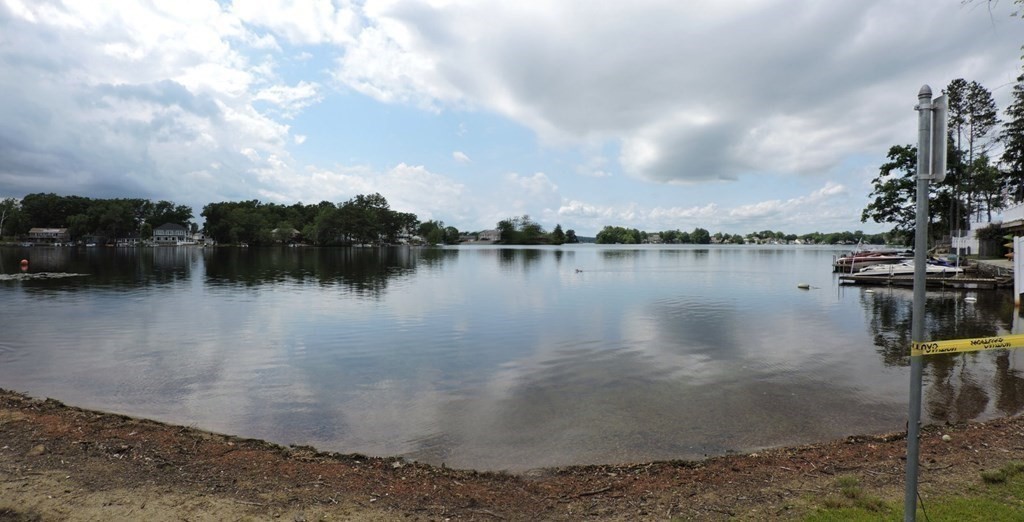 2 Hall Road Webster, MA 01570 - Photo 38 of 42 a view of a lake with houses in the back