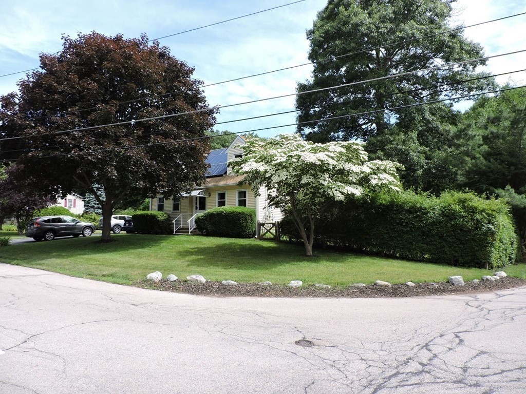 2 Hall Road Webster, MA 01570 - Photo 7 of 42 a view of a house with a yard and tree s