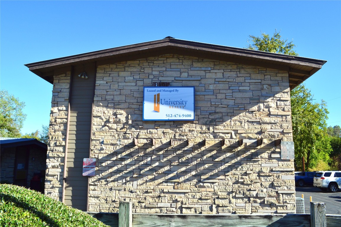 5001 Bull Creek Road, Unit 116 Austin, TX 78731 - Photo 13 of 13 a front view of a house with a garden