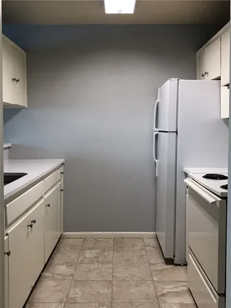 a view of backyard with swimming pool and outdoor seating