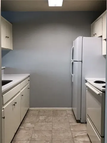 a view of backyard with swimming pool and outdoor seating