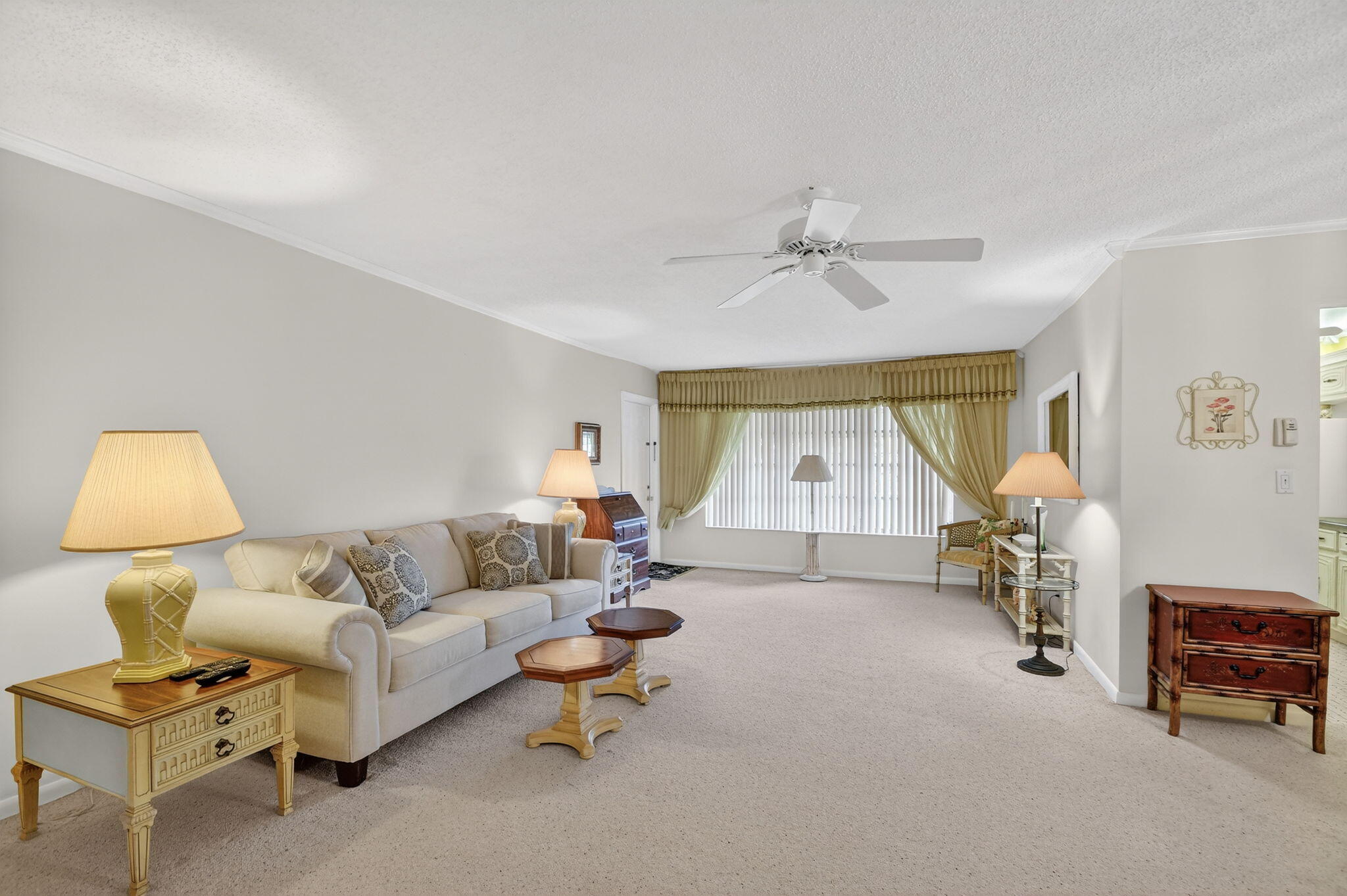 615 High Point Drive, Unit C Delray Beach, FL 33445 - Photo 11 of 48 a living room with furniture and a window
