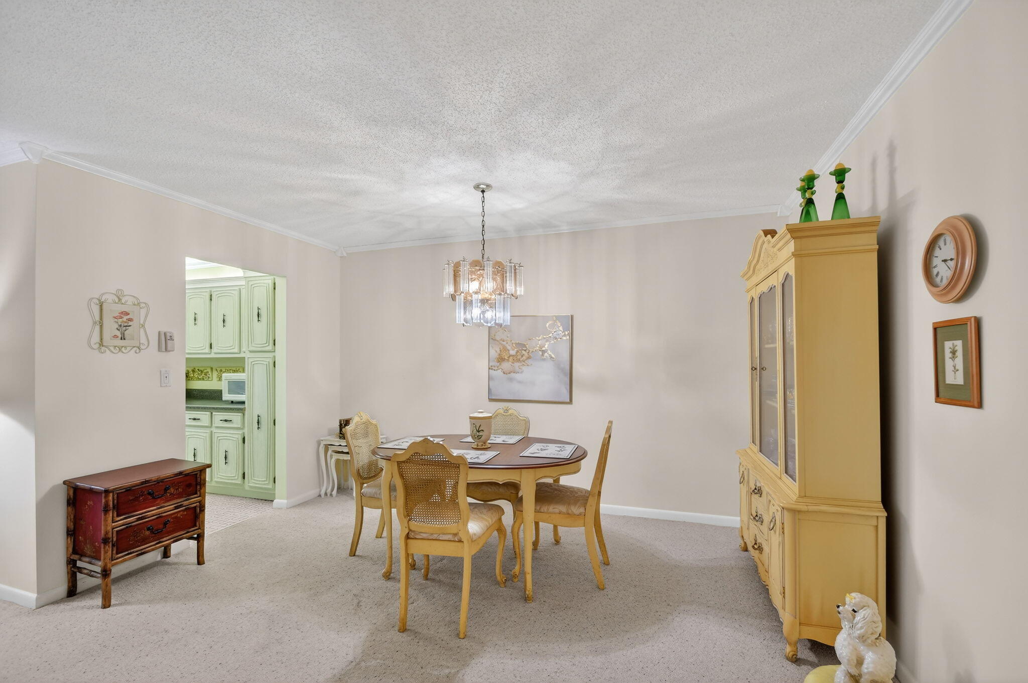 615 High Point Drive, Unit C Delray Beach, FL 33445 - Photo 13 of 48 a dining room with furniture and window