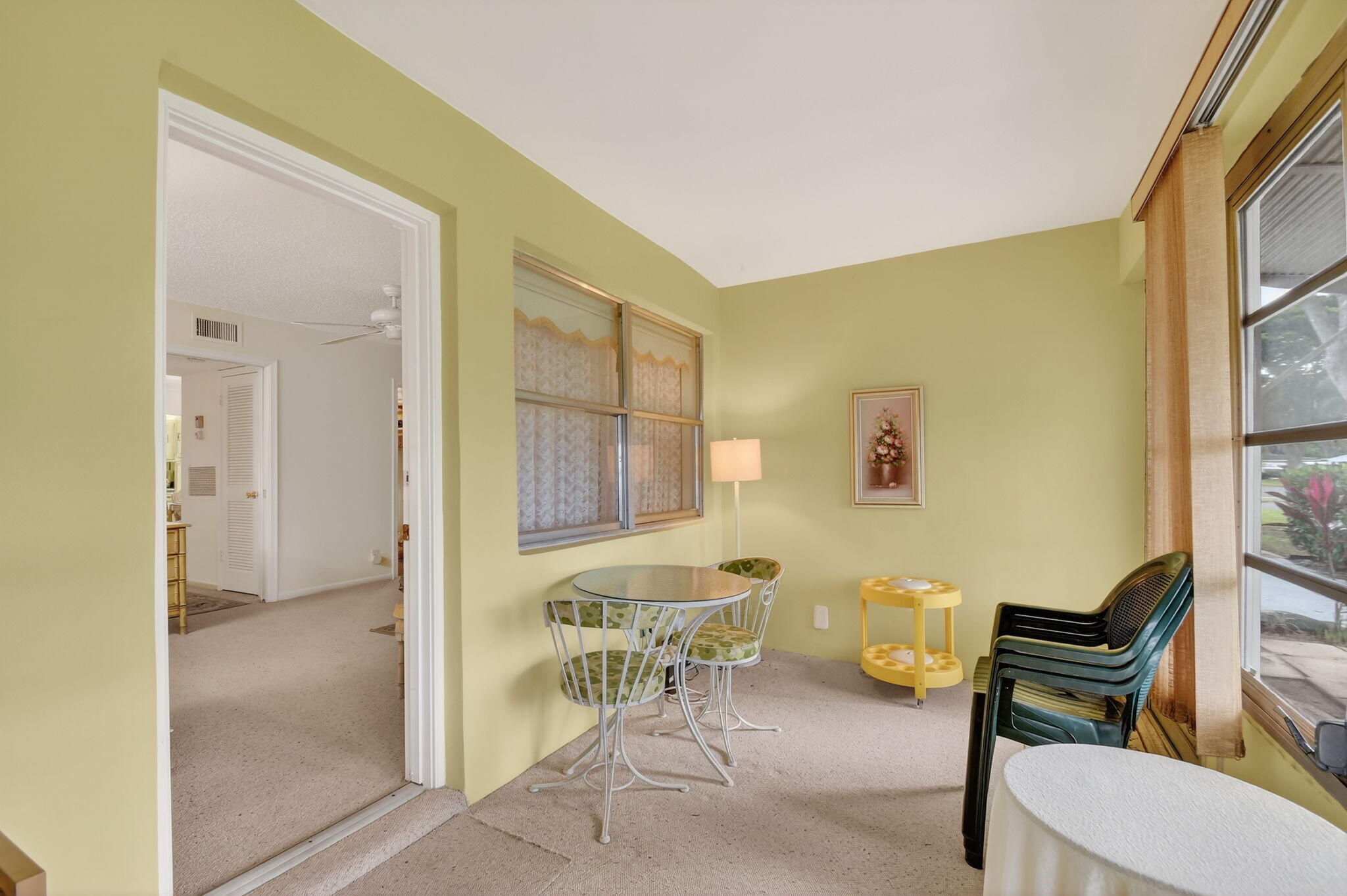 615 High Point Drive, Unit C Delray Beach, FL 33445 - Photo 33 of 48 a living room with furniture and a window