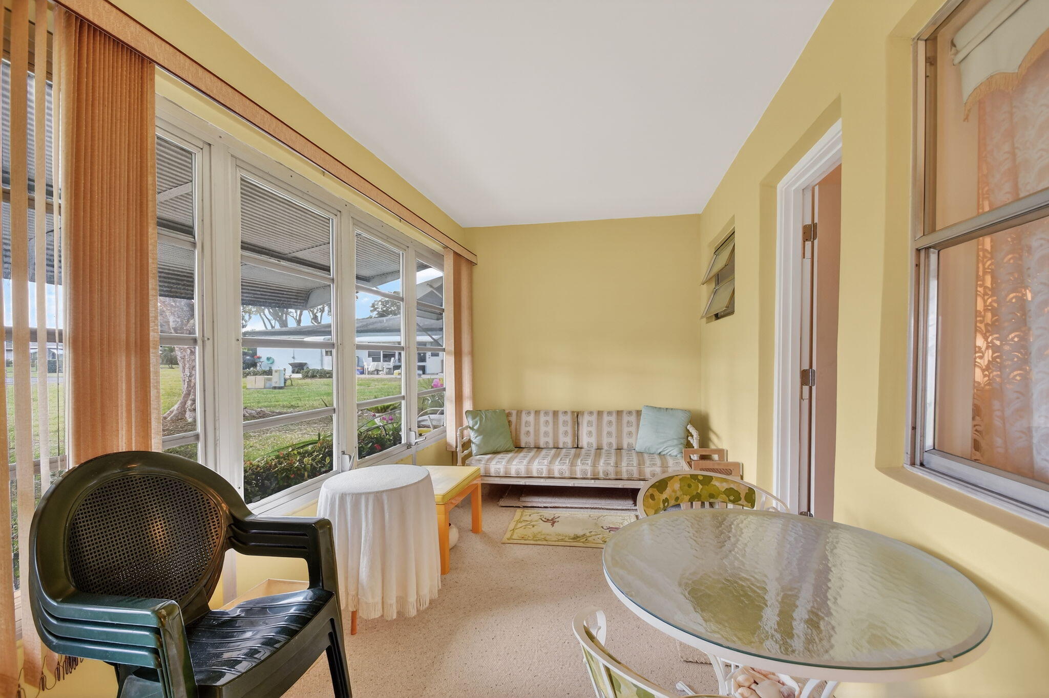615 High Point Drive, Unit C Delray Beach, FL 33445 - Photo 34 of 48 a living room with furniture and a window