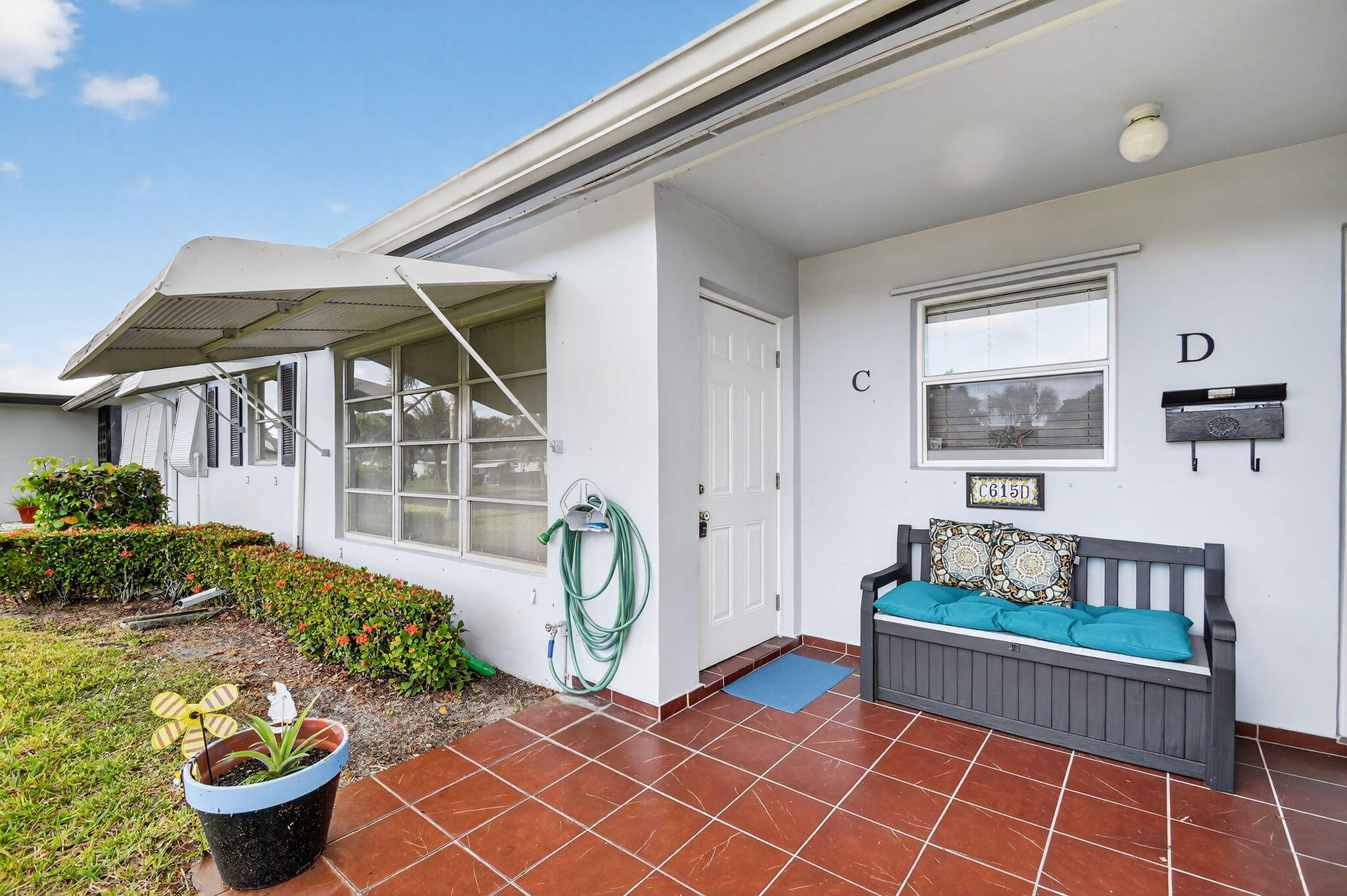 615 High Point Drive, Unit C Delray Beach, FL 33445 - Photo 4 of 48 a view of outdoor space yard and patio