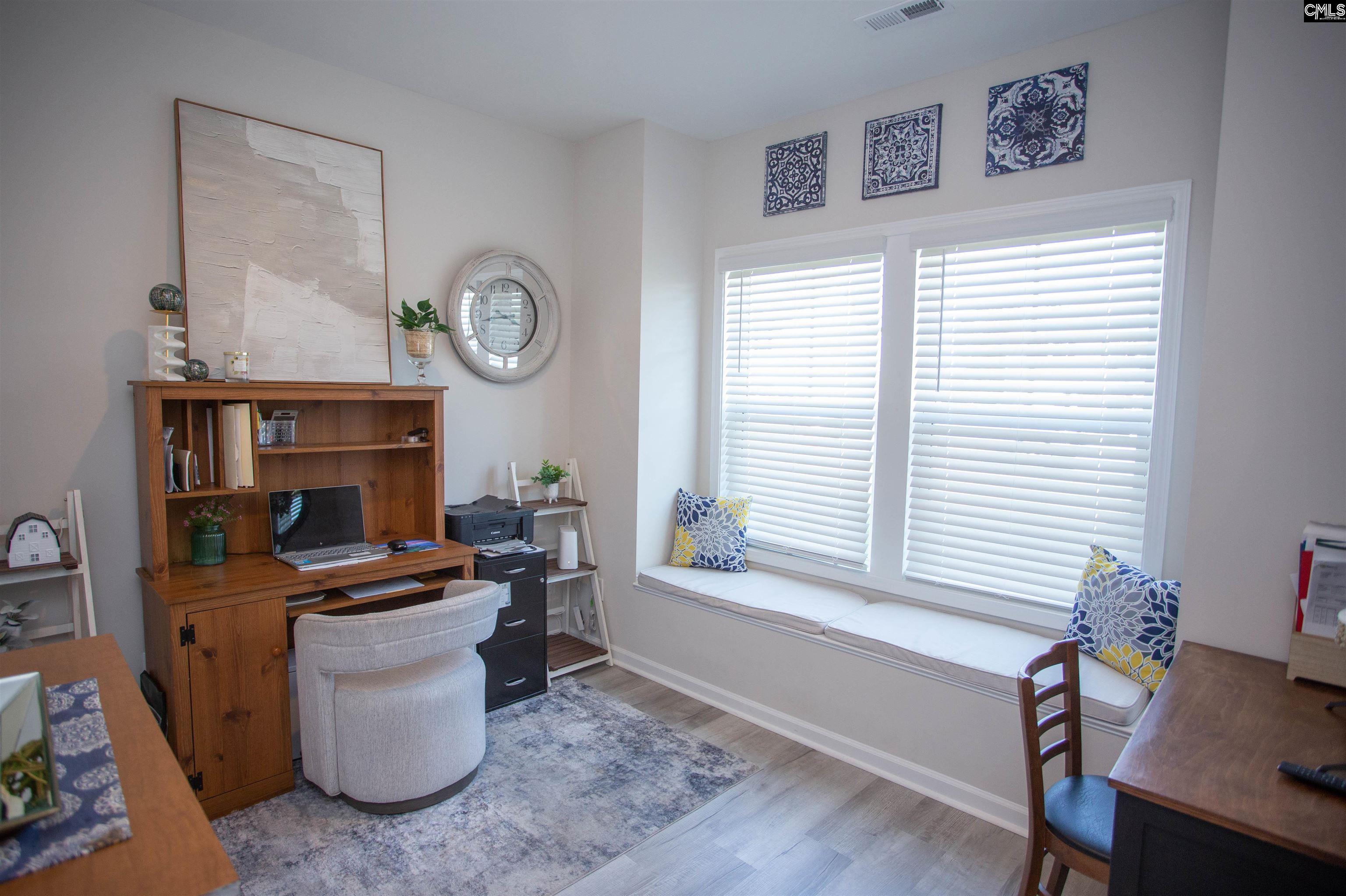 272 Shadowbrook Way Camden, SC 29020 - Photo 32 of 43 a view of a workspace with furniture and a window