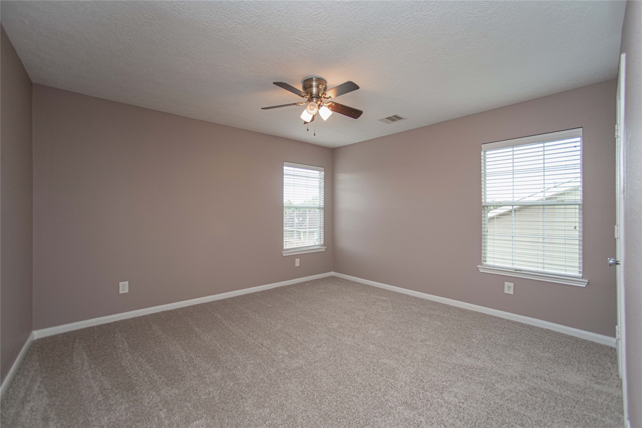 29314 Legends Bluff Drive Spring, TX 77386 - Photo 23 of 31 a view of an empty room with a window