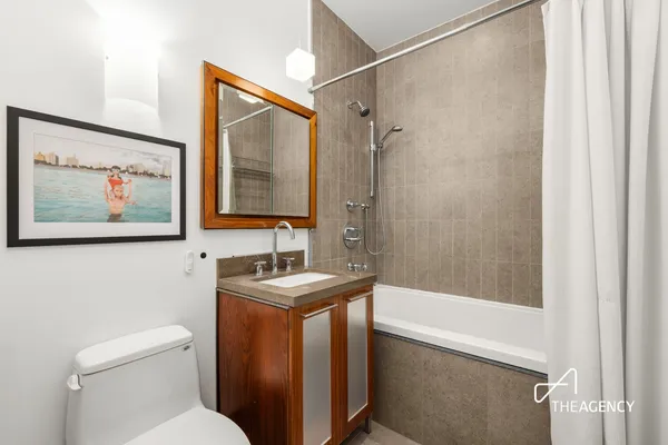a bathroom with a shower and a toilet