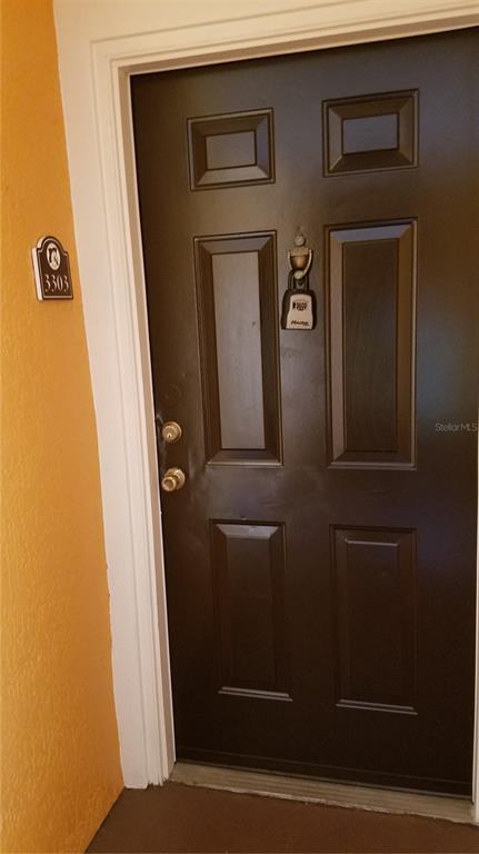 5455 Vineland Road, Unit 3303 Orlando, FL 32811 - Photo 2 of 8 a view of door