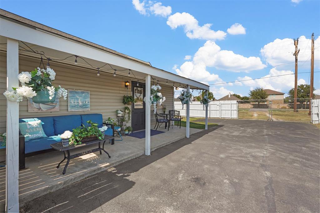 20602 Hackberry Creek Park Road Frisco, TX 75036 - Photo 19 of 20 a living room filled with furniture