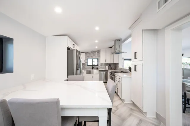 a view of a wooden deck and a lake