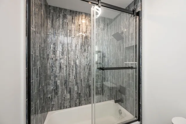 a view of a house with a yard porch and sitting area