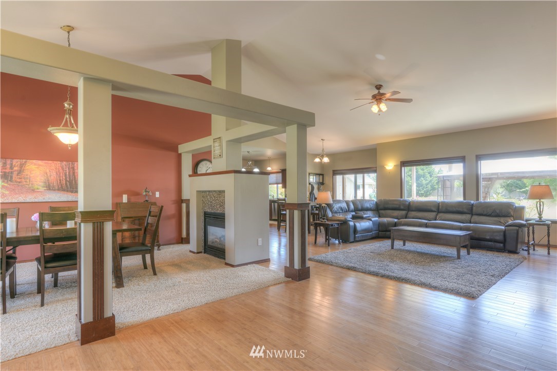 8422 180th Way Southwest Rochester, WA 98579 - Photo 20 of 34 a living room with furniture and wooden floors