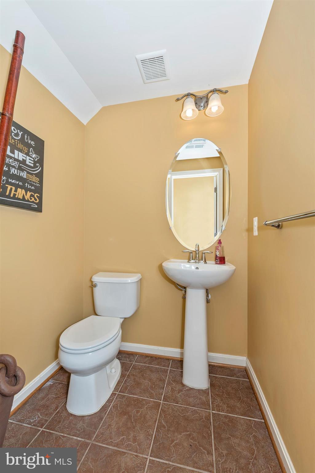 649 Tivoli Road Frederick, MD 21703 - Photo 21 of 28 Tiled Half Bath in Basement level
