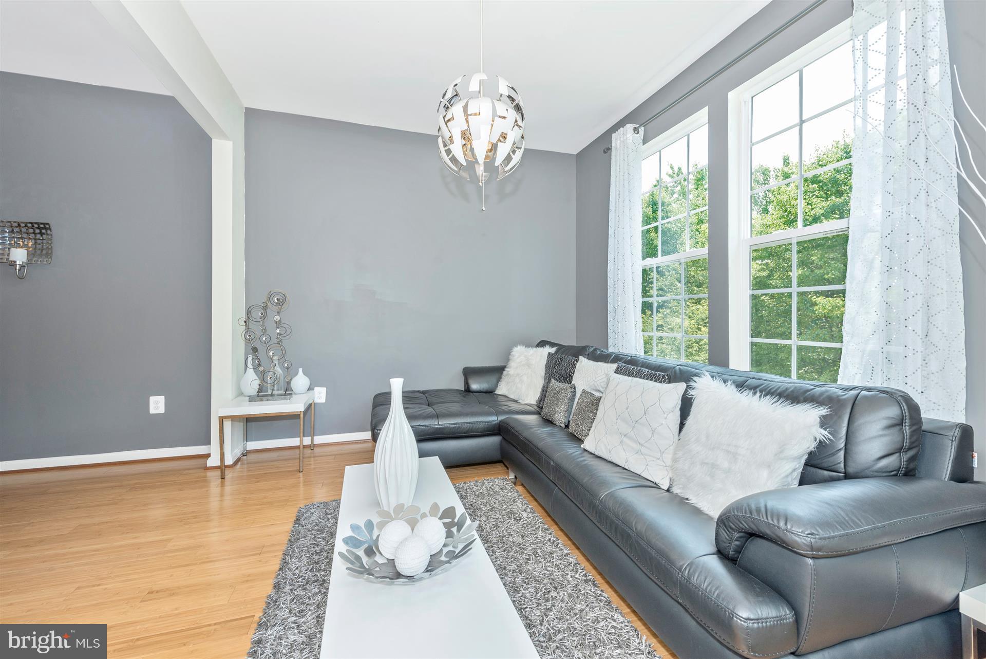 649 Tivoli Road Frederick, MD 21703 - Photo 9 of 28 Spacious Family Room with hardwood floors