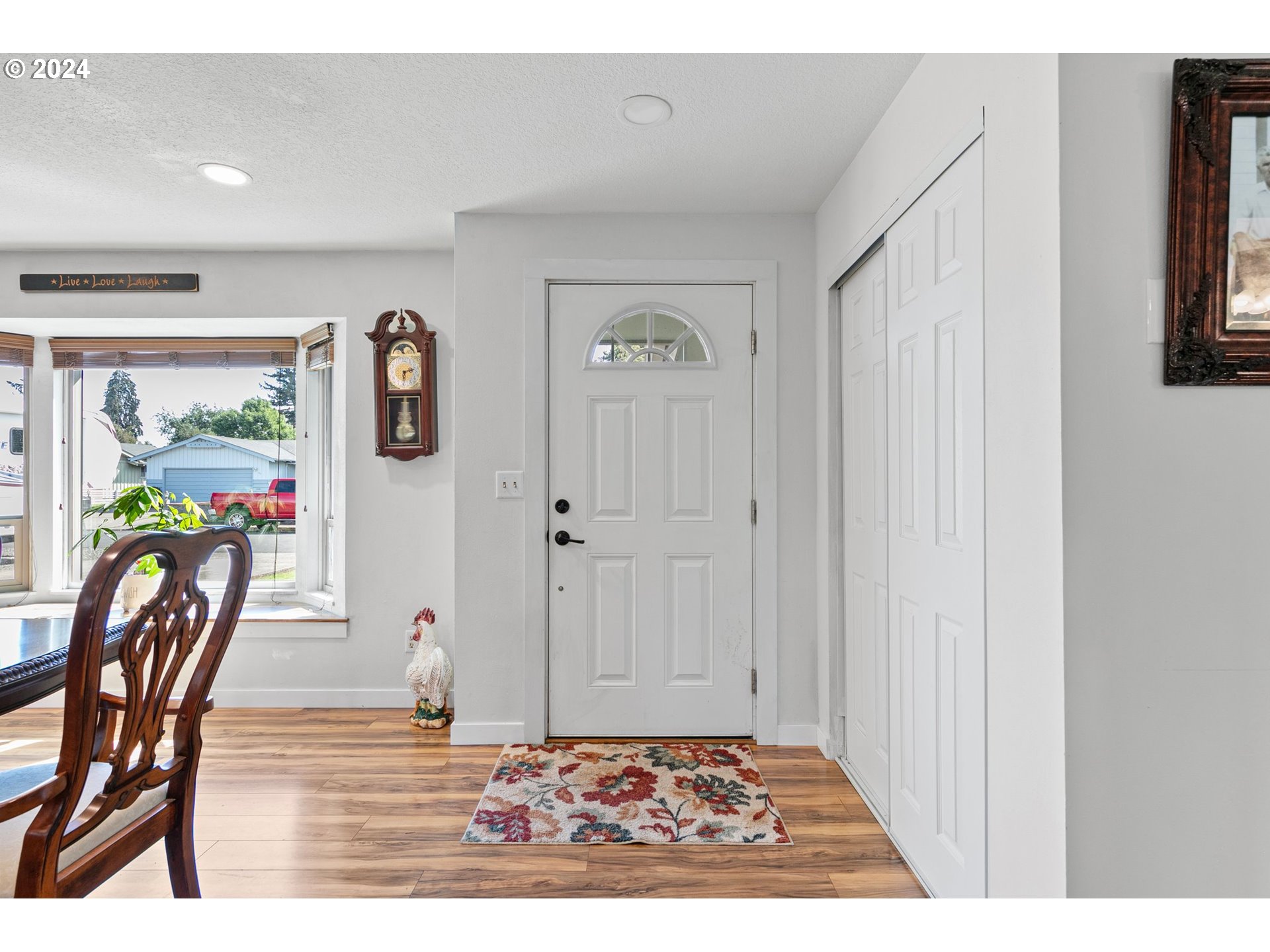 390 Cambridge Street Springfield, OR 97477 - Photo 6 of 48 a view of an entryway with wooden floor