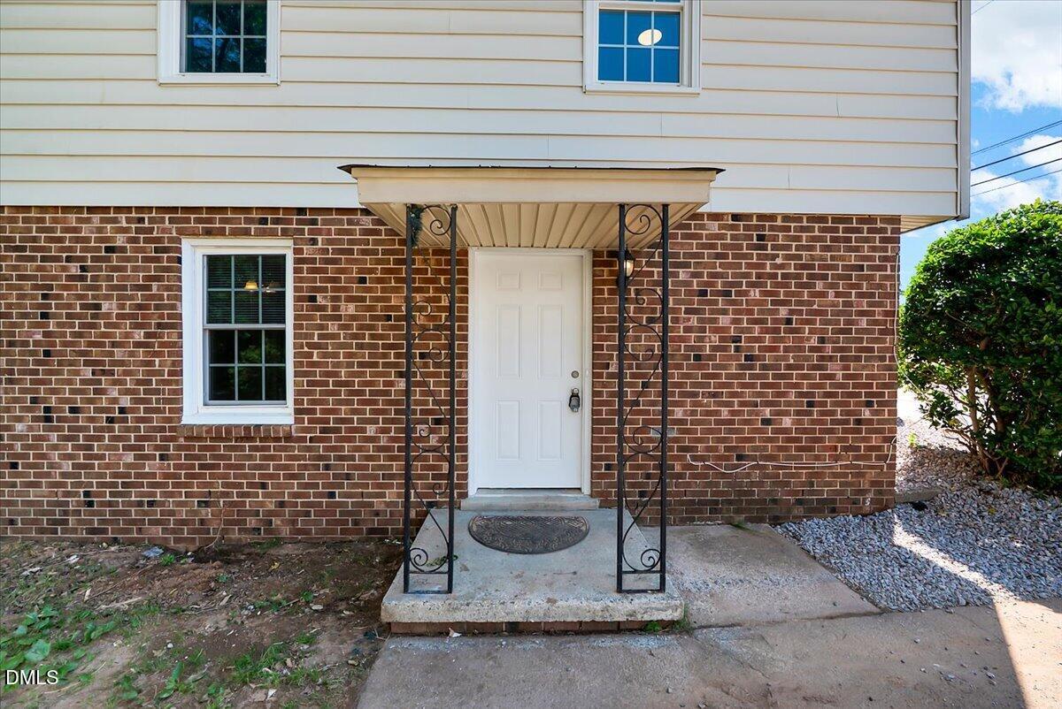 3408 Atlantic Avenue Raleigh, NC 27604 - Photo 21 of 48 a front view of a house with a window