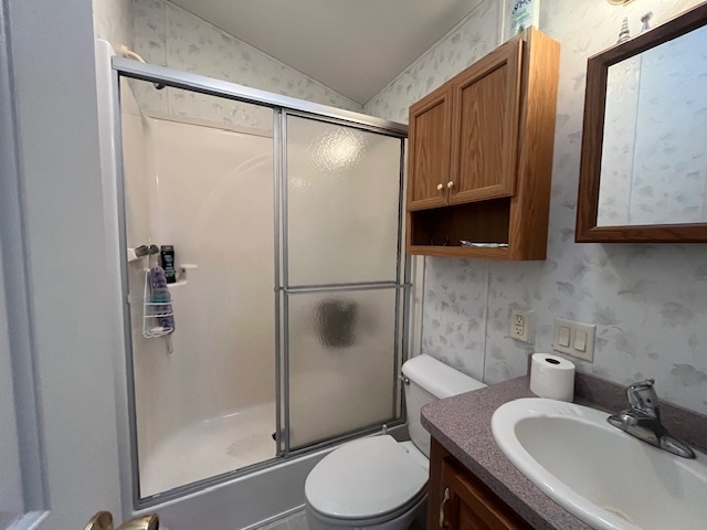 2795 East 28th Road Marseilles, IL 61341 - Photo 15 of 57 a bathroom with a sink toilet and shower