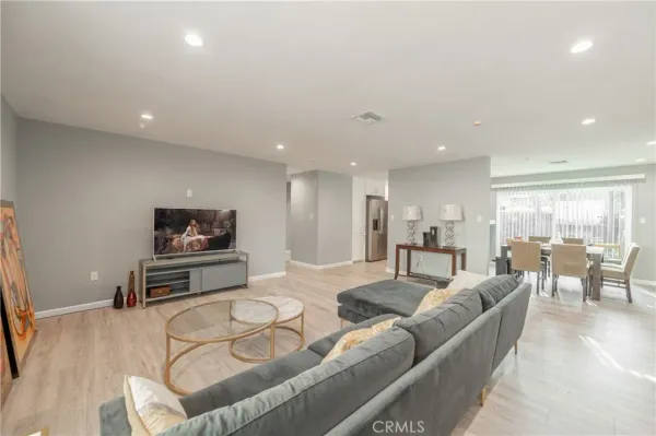 a kitchen with a stove top oven sink and cabinets