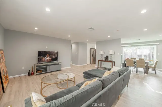 a kitchen with a stove top oven sink and cabinets