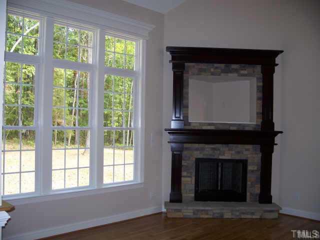 838 Oaks Lane Road Timberlake, NC 27583 - Photo 3 of 9 Living Room,Gas Logs,Stone Surround.