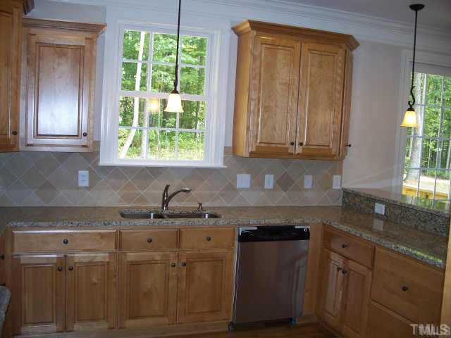 838 Oaks Lane Road Timberlake, NC 27583 - Photo 6 of 9 Granite counters,ss appliances.