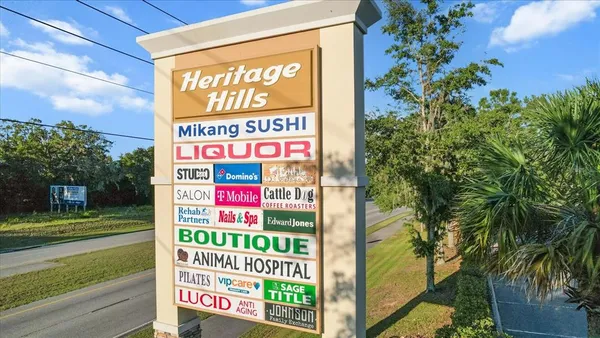 an aerial view of a house with garden view