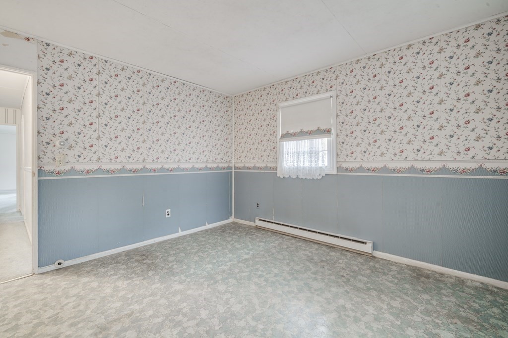 80 Embassy Road Springfield, MA 01119 - Photo 23 of 38 an empty room with windows
