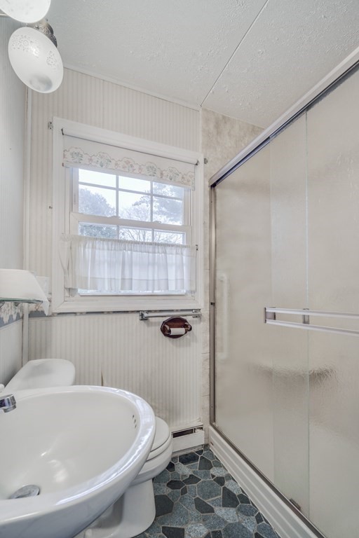 80 Embassy Road Springfield, MA 01119 - Photo 31 of 38 a bathroom with a sink and shower