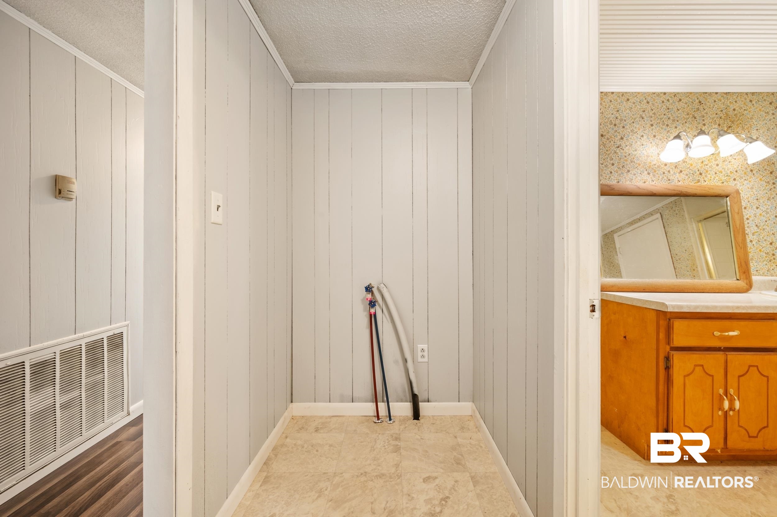 57623 Mary Hadley Road Perdido, AL 36562 - Photo 20 of 34 Washroom with wood walls and baseboards