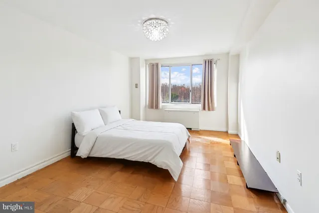 a kitchen with sink cabinets and window