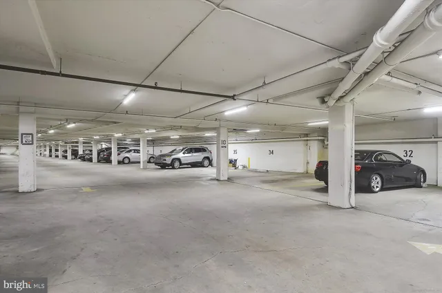 a room with gym equipment and windows