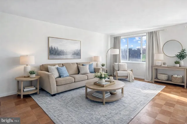 a living room with furniture flowerpot and window