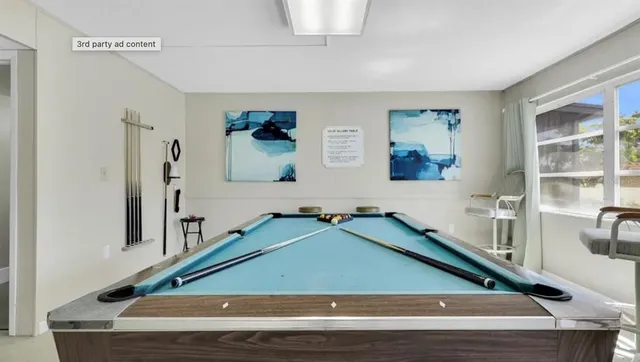 a view of a chairs and table in the patio