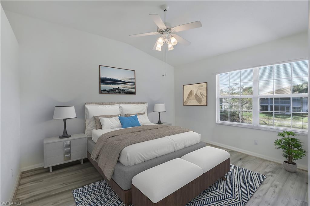 6812 Satinleaf Road South, Unit 204 Naples, FL 34109 - Photo 23 of 39 a bedroom with bed and a window