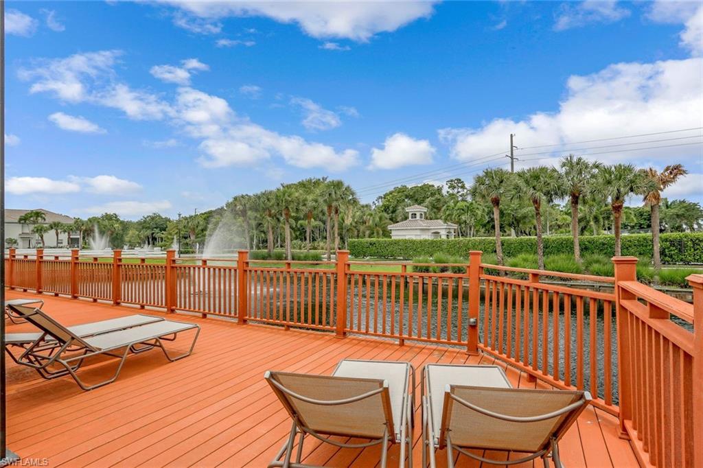 6812 Satinleaf Road South, Unit 204 Naples, FL 34109 - Photo 38 of 39 a balcony with chairs