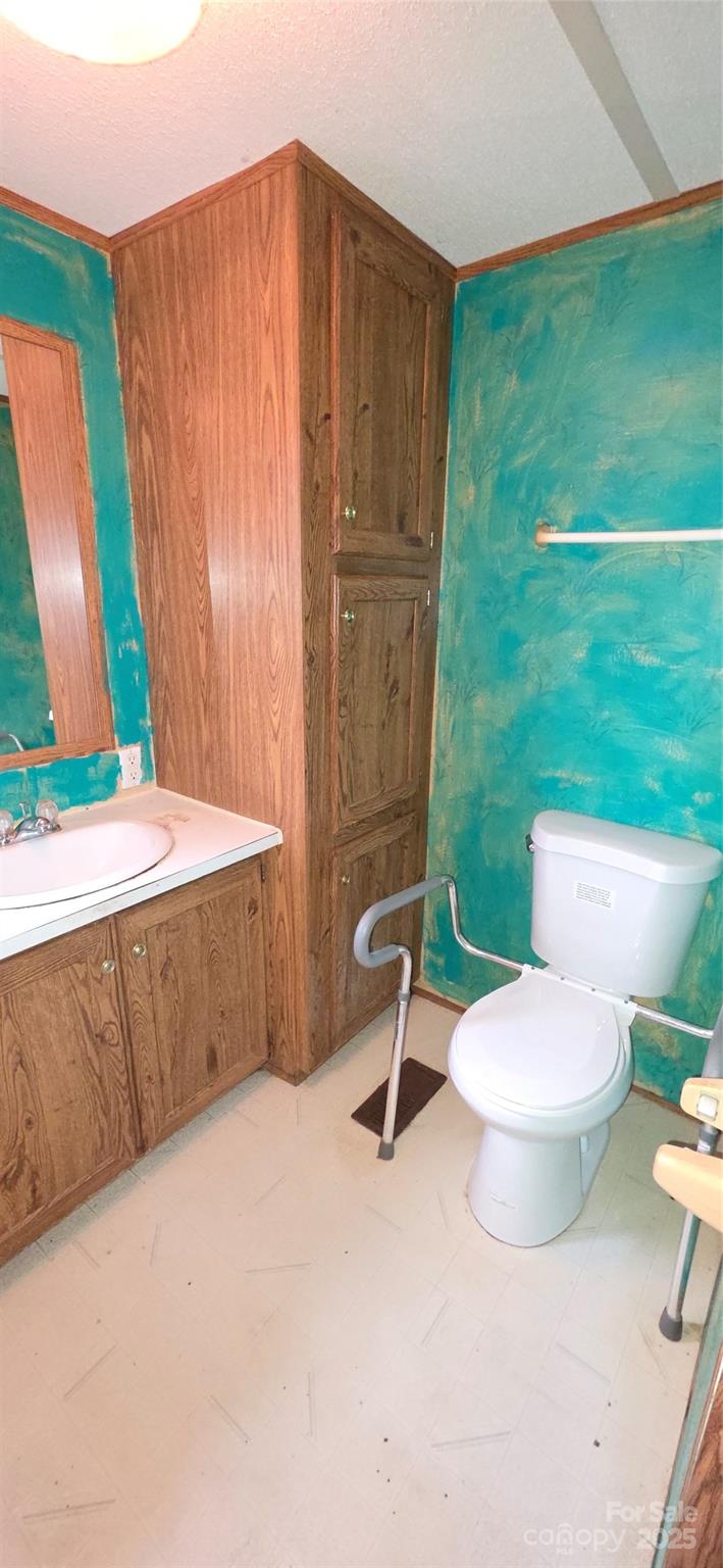 2111 Boxcar Road Lancaster, SC 29720 - Photo 13 of 21 a bathroom with a sink a toilet and tub