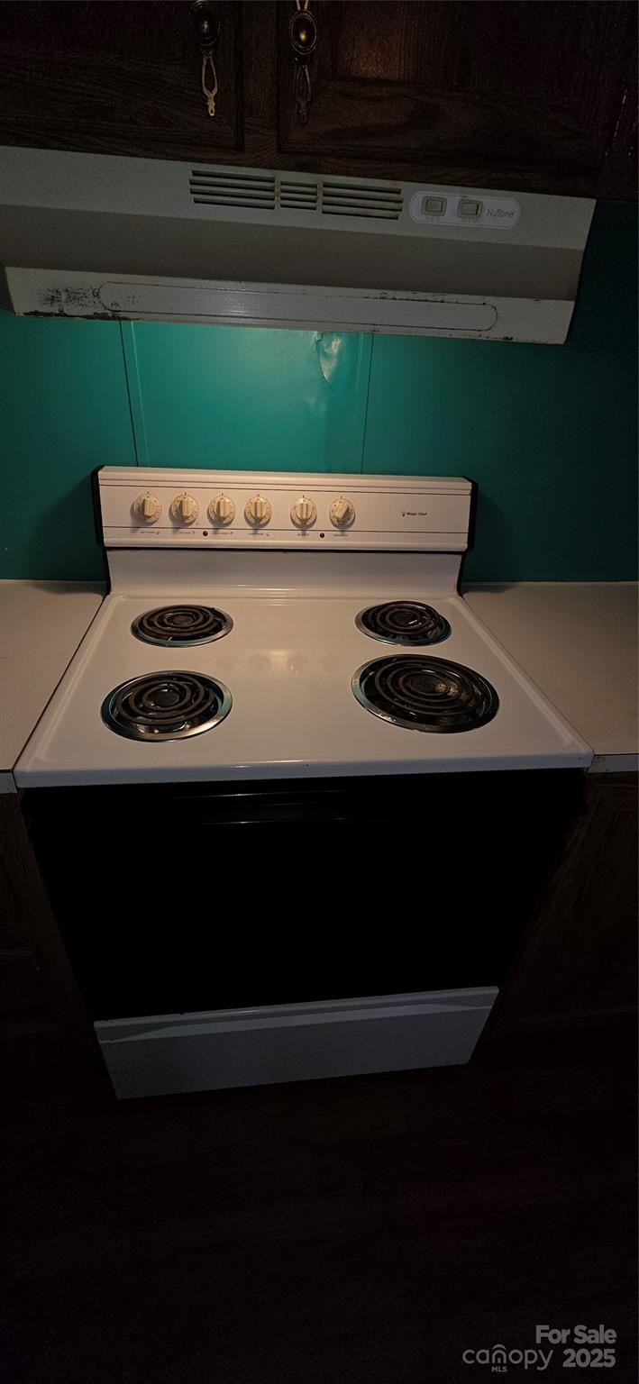 2111 Boxcar Road Lancaster, SC 29720 - Photo 17 of 21 a kitchen with a sink a stove and a microwave oven
