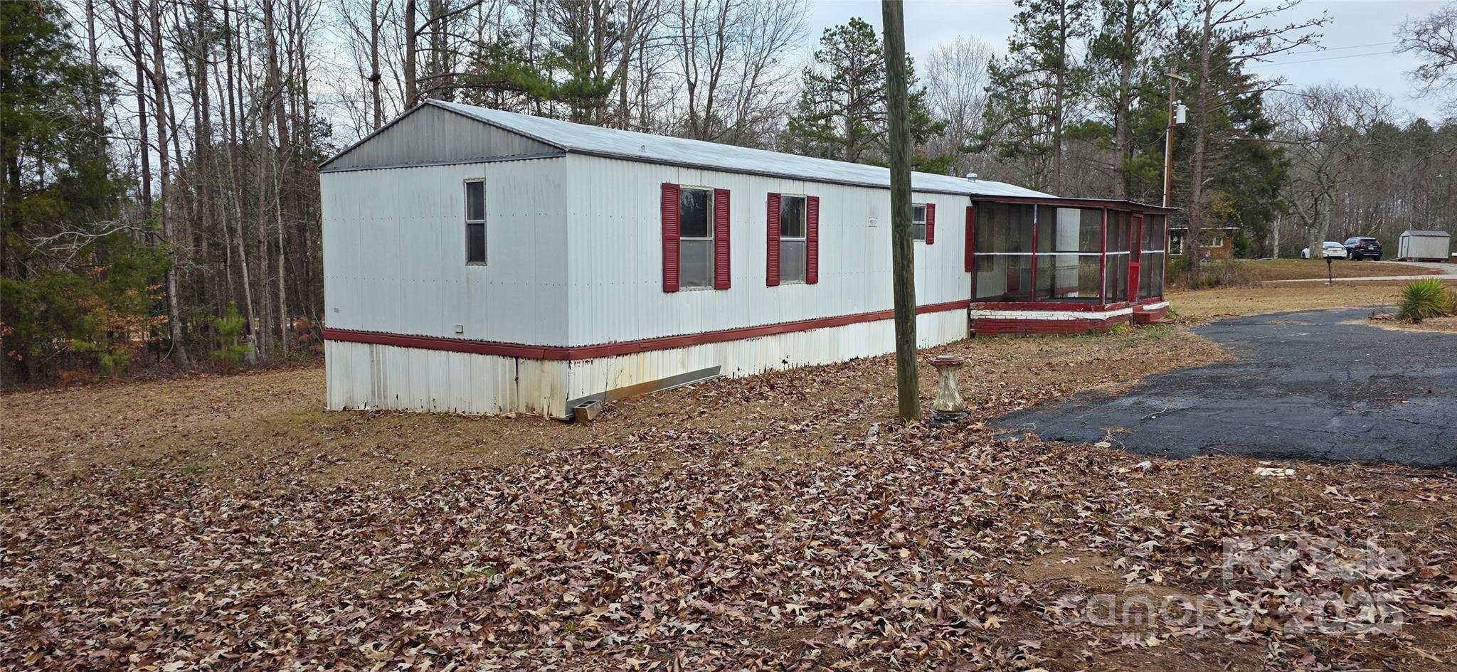 2111 Boxcar Road Lancaster, SC 29720 - Photo 19 of 21 a front view of a house with garden