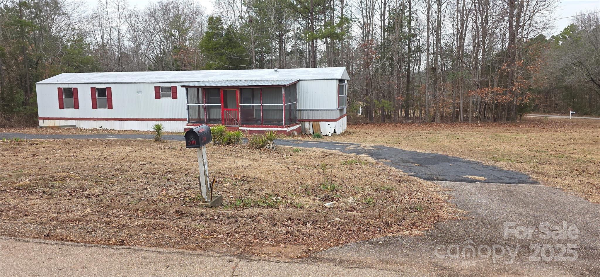 2111 Boxcar Road Lancaster, SC 29720 - Photo 5 of 21 a view of a house with a yard and large tree