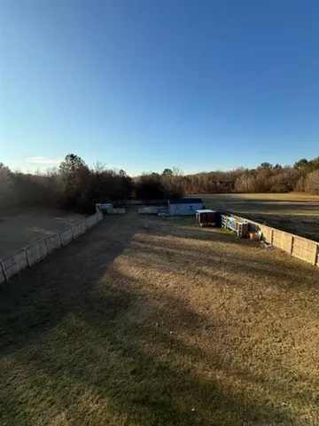 a view of a lake with mountain in the background