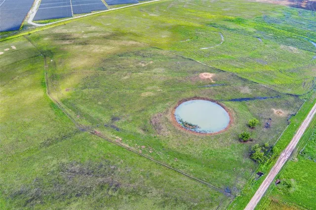 a view of a outdoor space and swimming pool